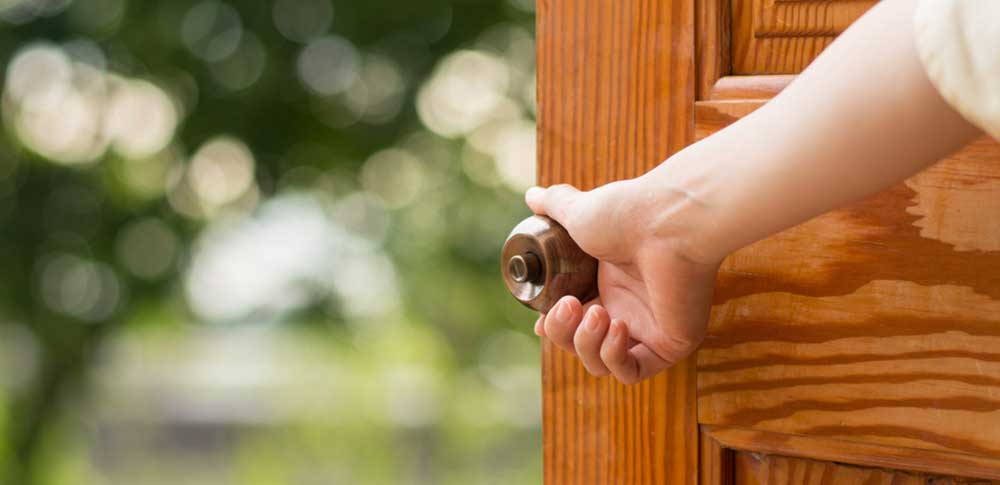 Why do the entry doors to most homes open inward, while in most public  buildings, the entry doors open outward?